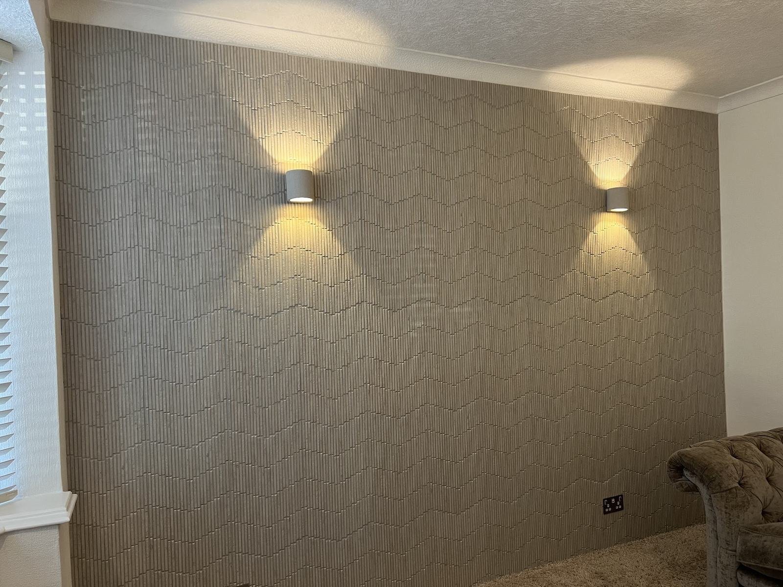 Abdul's textured feature wall with the lights on